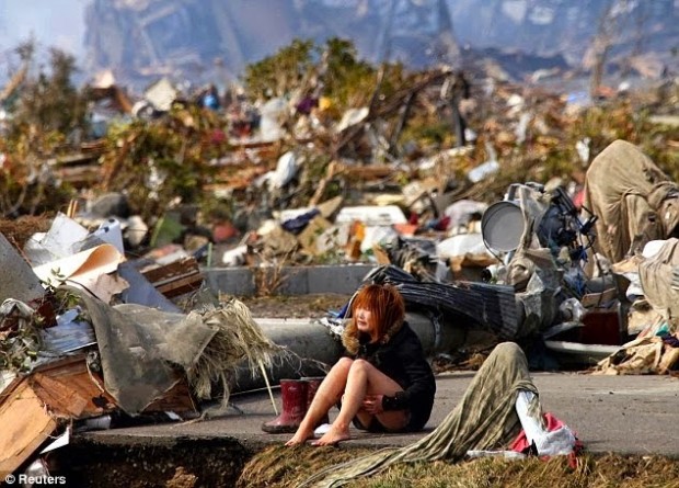 Girl-devastated-after-the-tsunami-that-hit-Japan-in-2011
