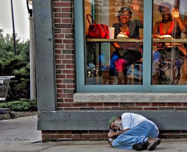 Ignorance-is-bliss-–-Homeless-man-sleeps-outside-a-diner-in-Milwaukee