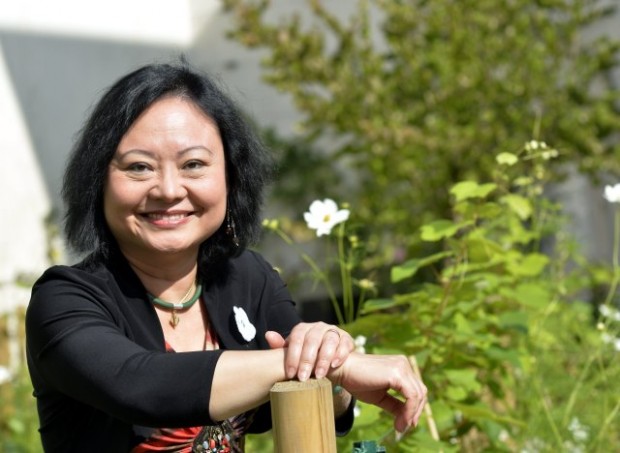 Kim Phuc poses after a meeting of the women's council 'Vrouwenraad' on August 30, 2013 in Brussels. Vrouwenraad invited Vietnamese born Canadian Phan Thi Kim Phuc for a q&a session, she is the girl pictured in an iconic picture taken by photographer Nick Ut during a napalm strike in the Vietnam war. AFP PHOTO/BELGA /ERIC LALMAND (Photo credit should read ERIC LALMAND/AFP/Getty Images)