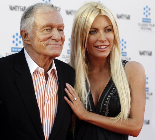 Hugh Hefner and his fiancee, Playboy Playmate Crystal Harris, arrive at the opening night gala of the 2011 TCM Classic Film Festival featuring a screening of a restoration of 'An American In Paris' in Hollywood, California in this file photo from April 28, 2011. Harris and Hefner tied the knot December 31, 2012, after an aborted June 2011 attempt. REUTERS/Fred Prouser/Files (UNITED STATES - Tags: ENTERTAINMENT)